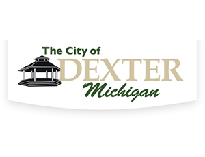Logo for the City of Dexter Michigan. On the left, there is an illustration of a gazebo, with the words "The City of Dexter Michigan" on the right.