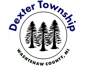 Logo for Dexter Township. It is circular, with the text "Dexter Township" making the top of the circle, and the text "Washtenaw County, MI making the bottom. In the center of the circle are three illustrated pine tree silhouettes.
